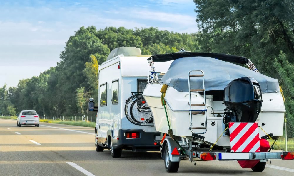 RV pulling a boat.