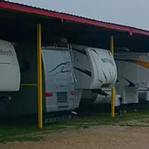 recreational vehicles parked at an interstate rest area in Arizona
